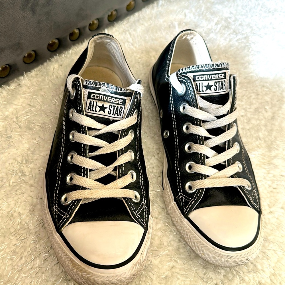 Black and white leather chucks